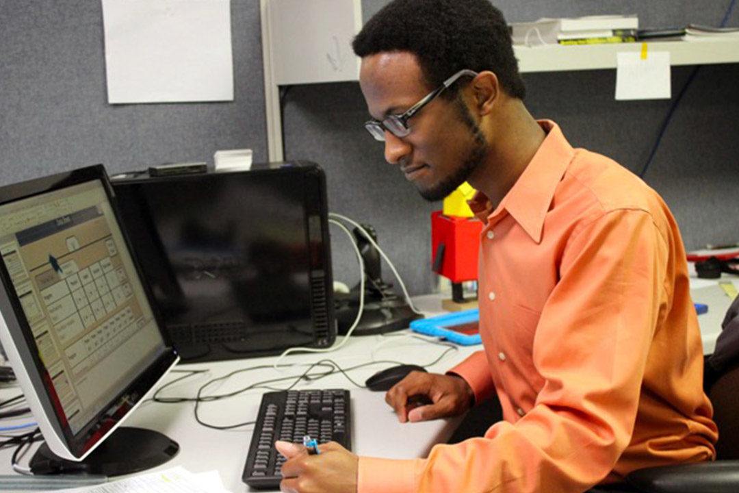 man working at computer