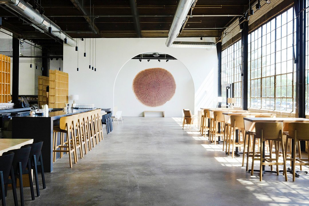 The interior of Brother Justus Whiskey, with a cross-section of a huge tree trunk mounted on the wall