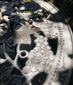 A close up photo of detailed stonework with a beautiful interplay of light and shadow